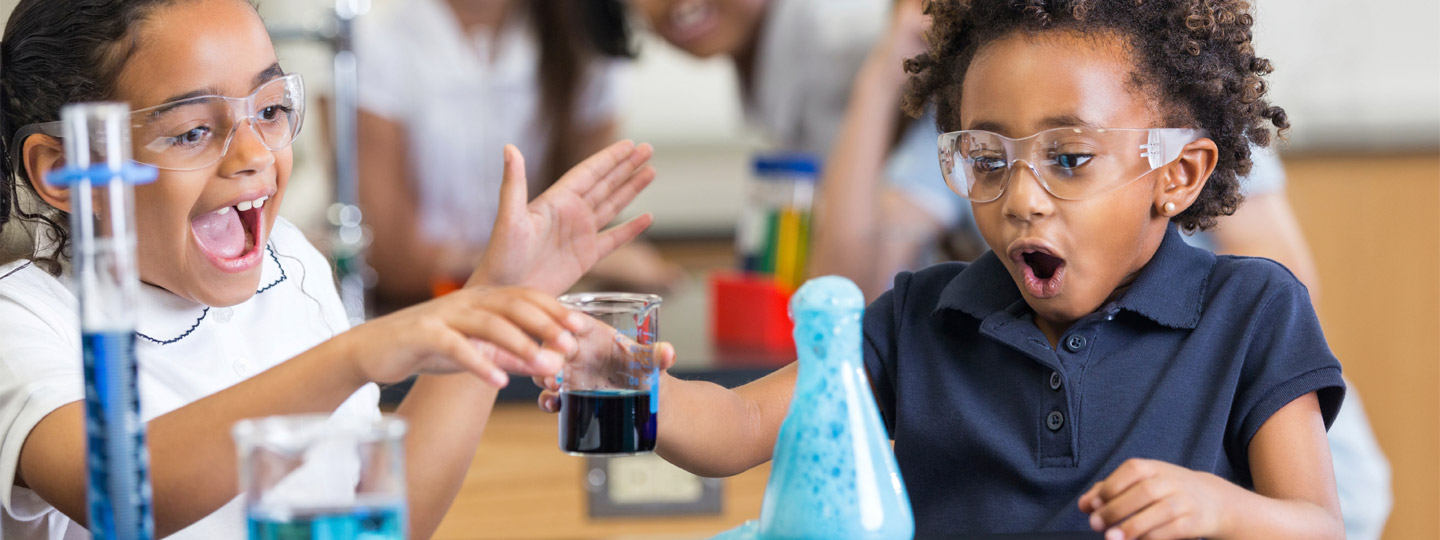 Young children engaged in science