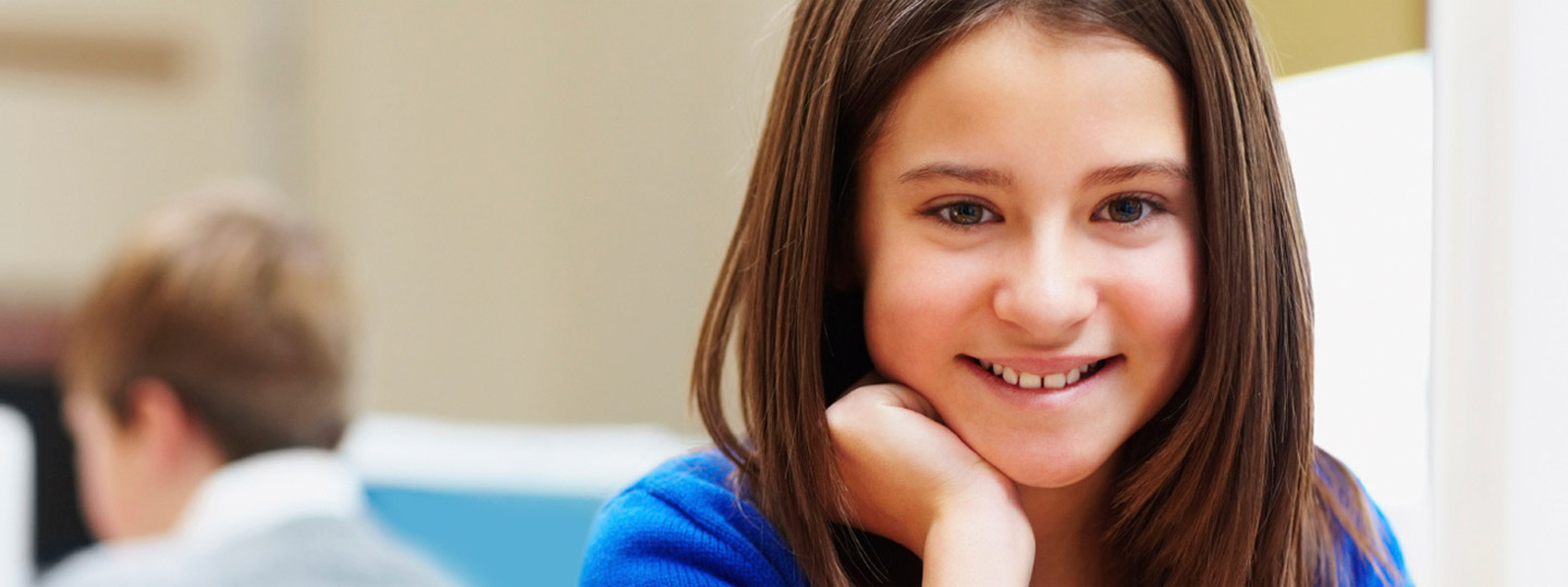 Photo of young girl looking directly at camera