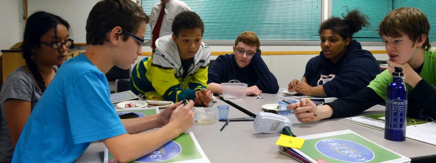 Students collaborating on science project